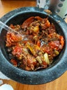 Sambal or sambel korek or setan or pedas or cabai or cabe or traditional hot chilli.