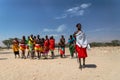Maasai people are dancing and celebrating outdoors in the samburian wilderness