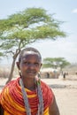 Samburu, Kenya/Africa - 10.05.2014: Outdoor portrait of a young native woman with colorful necklace and handmade jewelry