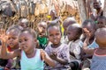 Portrait of child among other children in masai village in Samburu