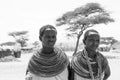 Portrait of two young maasai girls with traditional jewelery and clothing