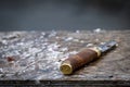 Same Knife On Cutting Board full of Fish Scales Royalty Free Stock Photo