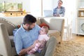 Same sex couple at home with daughter Royalty Free Stock Photo