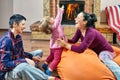 Same sex couple and little daughter are playing Royalty Free Stock Photo