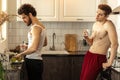 Same-sex gay couple have breakfast at home Royalty Free Stock Photo