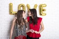 Same sex love concept. Two beautiful females women girls from lgbt community with long gorgeous hair on February 14th Happy valent Royalty Free Stock Photo