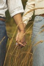 Same-sex love of girls. Girls hold hands during quarantine