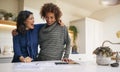 Same Sex Mature Female Couple Reviewing Domestic Finances And Investments In Kitchen At Home Royalty Free Stock Photo