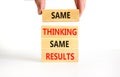 Same thinking and results symbol. Concept word Same thinking same results on wooden blocks. Beautiful white table white background Royalty Free Stock Photo