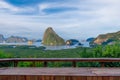 Samet Nangshe viewpoint mountain landscape Phang Nga bay Phuket Thailand with wooden bench foreground