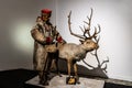 Sami man with a reindeer inside Grigore Antipa National Museum of Natural History