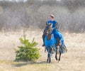 SAMOLVA, PSKOVSKAYA OBLAST, RUSSIA - APRIL 22: unindentified horseback rider on a horse of historical reconstruction of the Batle