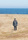 SAMOLVA, PSKOVSKAYA OBLAST, RUSSIA - APRIL 22: unindentified police officer watching order on historical reconstruction of the Bat