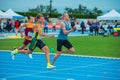 SAMORIN, SLOVAKIA, 9. JULY: Track and Field professional 400m race. Male Athletes running on blue athletics track. Sport photo.