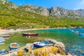 Fishing boats in beautiful bay with mountains in background, Samos island, Greece Royalty Free Stock Photo