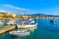 Greek fishing boats at sunrise in small port, Samos island, Greece Royalty Free Stock Photo