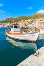 Typical fishing boat in Vathy port on beautiful summer day, Samos island, Greece Royalty Free Stock Photo