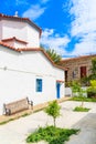 Beautiful white small church in Kokkari village, Samos island, Greece Royalty Free Stock Photo