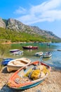 Traditional fishing boats on beautiful secluded beach, Samos island, Greece Royalty Free Stock Photo