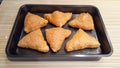 Samosa cooked in the oven . Cakes of flaky pastry stuffed Royalty Free Stock Photo
