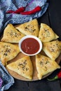 Samosa with pumpkin - traditional oriental pastries Royalty Free Stock Photo