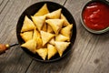 Samosas Indian snack in frying pan