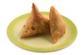 Samosas a spicy blend of vegetables or meat wrapped in a deep fried triangular pastry parcel. Royalty Free Stock Photo