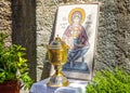 The samovar and the icon in front of monastery Royalty Free Stock Photo