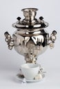 Samovar over a cup of tea. Royalty Free Stock Photo