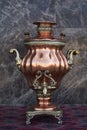 Samovar, russian tea pot. Vintage samovar on marble background