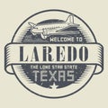 Samp or tag with airplane and text Welcome to Texas, Laredo