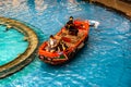 Sampan ride along the Canal at The Shoppes at Marina Bay Sands in a beautifully crafted Sampan boat. Royalty Free Stock Photo