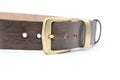sample of brown leather men`s belt with metal shiny handmade buckle, stitched on the edge Royalty Free Stock Photo