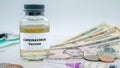 Covid19 vaccination and syringe injection with american money bills. Coronavirus Royalty Free Stock Photo