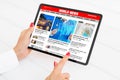 Sample news website shown on tablet Royalty Free Stock Photo