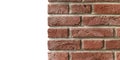 Sample of old brick wall isolated on white background with copy space. Detail of brick house closeup