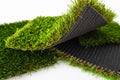 Sample pieces of green artificial grass of different thickness Royalty Free Stock Photo