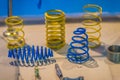 Sample product of blue and yellow metal helical coil springs.