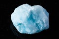 sample of raw blue aragonite mineral on black Royalty Free Stock Photo