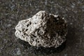 sample of rough pumice lava stone on black Royalty Free Stock Photo