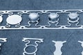 Sample of stamping part of metal drawing process on the progressive die in the light blue scene Royalty Free Stock Photo