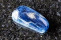 sample of tumbled blue kyanite gemstone on black Royalty Free Stock Photo