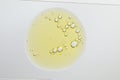 Sample of yellow facial gel on white background, top view Royalty Free Stock Photo