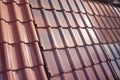 Samples of ceramic roofing tiles in a warehouse of a roofing mat