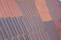 Samples of ceramic roofing tiles in a warehouse of a roofing mat Royalty Free Stock Photo