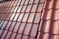 Samples of ceramic roofing tiles in a warehouse of a roofing mat