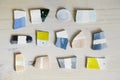 Samples of colored enamel for color ceramics, ceramic working process in studio.