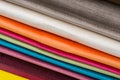 Samples of colorful interior fabrics. Book of fabrics for curtains, upholstery. Royalty Free Stock Photo