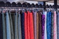 Samples of fabrics and materials in a drapery store, various types and colors of textiles for tailoring and interior decor Royalty Free Stock Photo