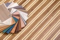 Samples of furniture or laminate  on desk of bamboo Royalty Free Stock Photo